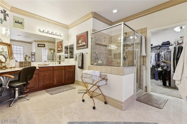 7301 Heggie Ave, Las Vegas, NV 89131 - bathroom with ornamental molding, a shower stall, vanity, tile patterned floors, and a spacious closet