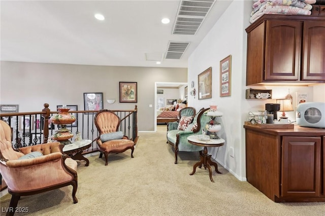 7301 Heggie Ave, Las Vegas, NV 89131 - sitting room featuring light carpet, recessed lighting, an upstairs landing, and baseboards