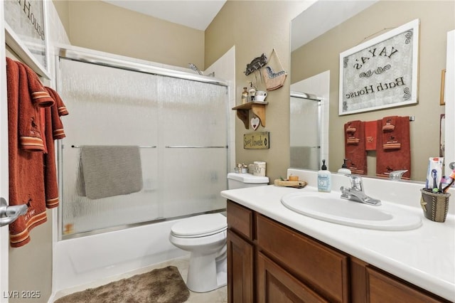 7301 Heggie Ave, Las Vegas, NV 89131 - bathroom with toilet, bath / shower combo with glass door, vanity, and tile patterned flooring