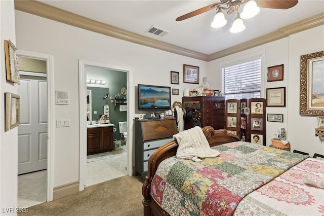 7301 Heggie Ave, Las Vegas, NV 89131 - bedroom with crown molding, light carpet, ensuite bathroom, light tile patterned floors, and ceiling fan