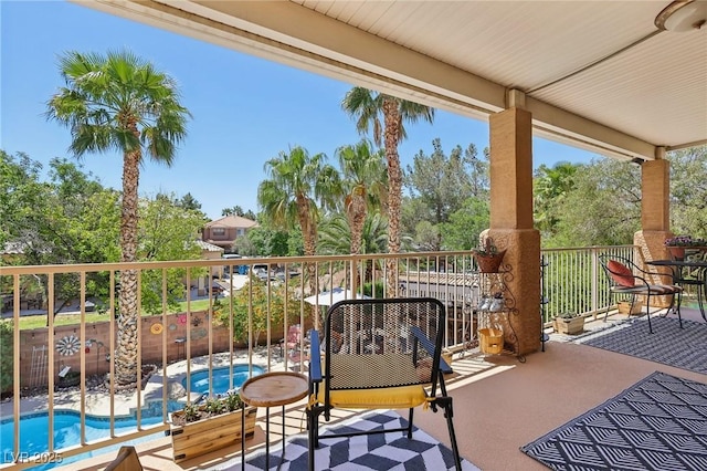 7301 Heggie Ave, Las Vegas, NV 89131 - balcony with view of pool, an in-ground hot tub, and view of scattered trees