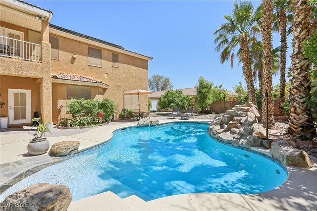 7301 Heggie Ave, Las Vegas, NV 89131 - view of pool with a patio and fence
