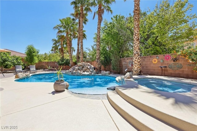 7301 Heggie Ave, Las Vegas, NV 89131 - view of pool featuring a fenced backyard, a patio, and a pool with connected hot tub