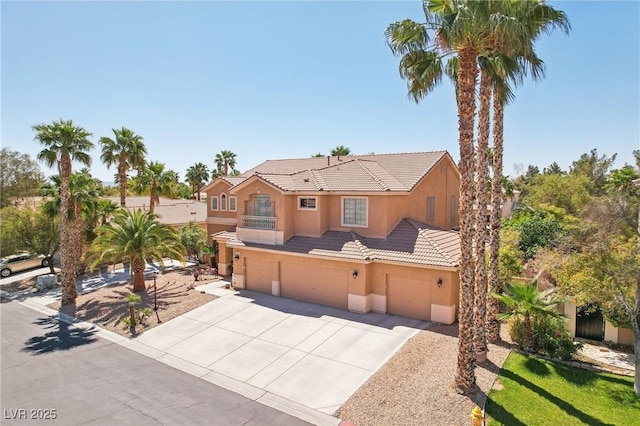 7301 Heggie Ave, Las Vegas, NV 89131 - mediterranean / spanish-style home with stucco siding, a garage, driveway, and a tile roof