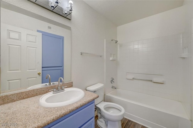 3318 N Decatur Blvd Unit 2129, Las Vegas, NV 89130 - full bath featuring vanity, toilet, shower / tub combination, and wood finished floors