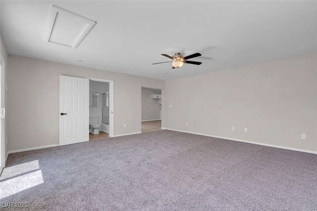 spare room with carpet floors, baseboards, and a ceiling fan