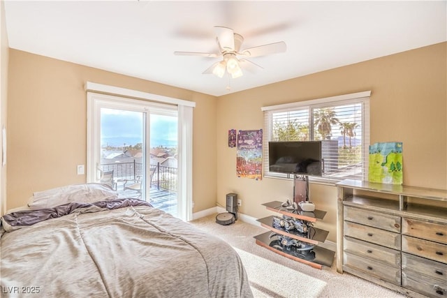 824 Schooner Dr, Henderson, NV 89015 - carpeted bedroom with access to outside, multiple windows, baseboards, and a ceiling fan
