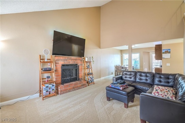 824 Schooner Dr, Henderson, NV 89015 - carpeted living room with baseboards, high vaulted ceiling, and a brick fireplace