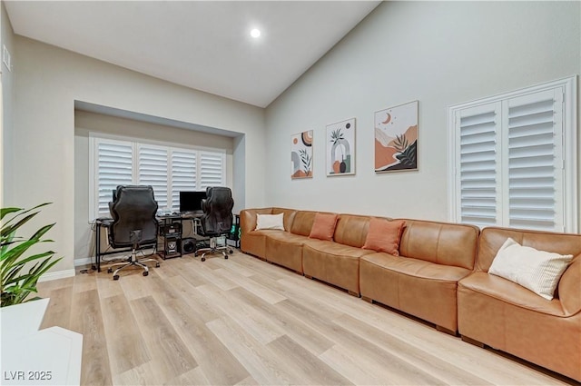 living room featuring an office area, wood finished floors, high vaulted ceiling, and recessed lighting