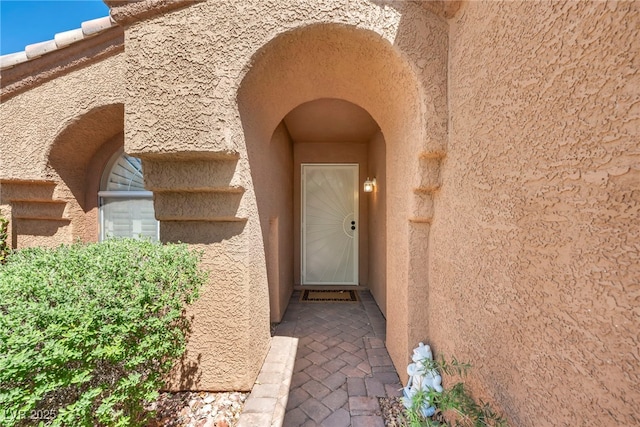 819 Arrowhead Trl, Henderson, NV 89002 - doorway to property featuring stucco siding