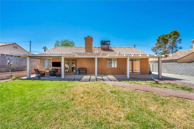 819 Arrowhead Trl, Henderson, NV 89002 - rear view of property featuring a chimney, stucco siding, and a patio