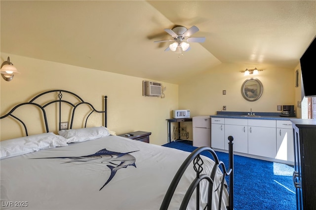 819 Arrowhead Trl, Henderson, NV 89002 - bedroom with freestanding refrigerator, lofted ceiling, a sink, a wall mounted AC, and dark carpet