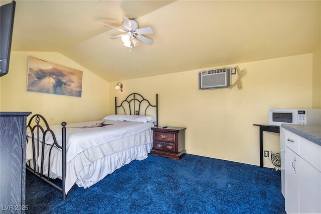 819 Arrowhead Trl, Henderson, NV 89002 - bedroom with lofted ceiling, dark carpet, an AC wall unit, and ceiling fan