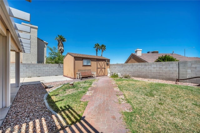 819 Arrowhead Trl, Henderson, NV 89002 - view of yard with a storage shed, a patio, and an outbuilding