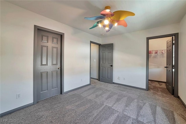 5740 Winter Cherry St, Las Vegas, NV 89130 - unfurnished bedroom featuring carpet floors, baseboards, and ceiling fan