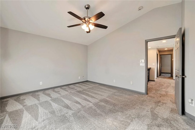 5740 Winter Cherry St, Las Vegas, NV 89130 - unfurnished room featuring vaulted ceiling, light colored carpet, a ceiling fan, baseboards, and a smoke detector