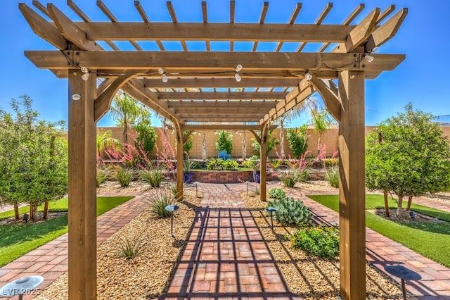 view of patio / terrace featuring a pergola and a fenced backyard