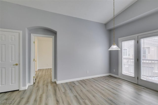 8675 Traveling Breeze Ave Unit 101, Las Vegas, NV 89178 - spare room featuring light wood finished floors and baseboards