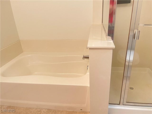 6255 W Arby Ave Unit 239, Las Vegas, NV 89118 - bathroom with a stall shower and a bath