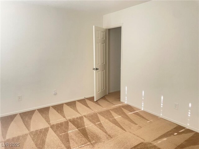 6255 W Arby Ave Unit 239, Las Vegas, NV 89118 - spare room with light carpet and baseboards