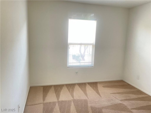 6255 W Arby Ave Unit 239, Las Vegas, NV 89118 - unfurnished room featuring carpet floors and baseboards