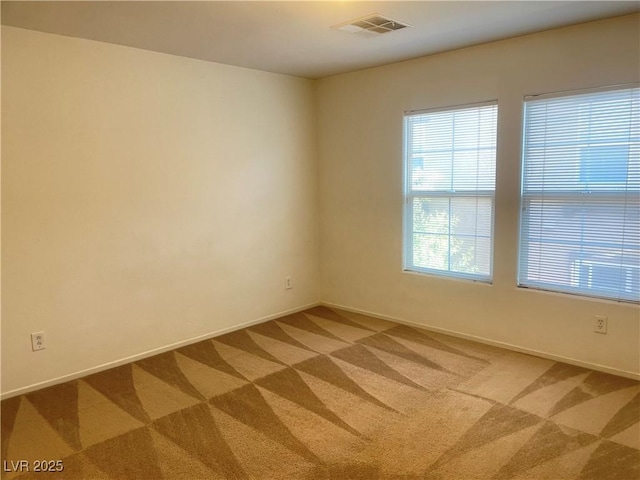 6255 W Arby Ave Unit 239, Las Vegas, NV 89118 - unfurnished room featuring light carpet and baseboards