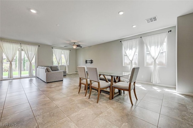 dining room with baseboards, ceiling fan, light tile patterned flooring, and recessed lighting