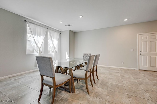 dining space featuring baseboards, recessed lighting, and light tile patterned floors