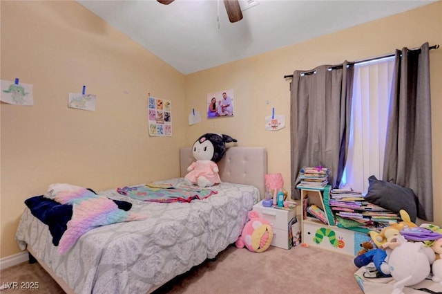 bedroom with carpet, ceiling fan, and vaulted ceiling