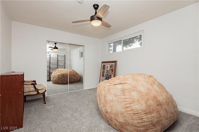 200 E Desert Rose Dr, Henderson, NV 89015 - living area with carpet floors, ceiling fan, and baseboards