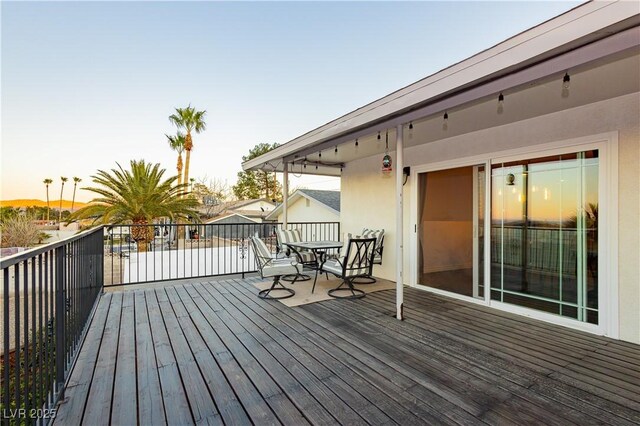 200 E Desert Rose Dr, Henderson, NV 89015 - deck at dusk with outdoor dining space