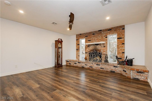 200 E Desert Rose Dr, Henderson, NV 89015 - unfurnished living room featuring wood finished floors, baseboards, a fireplace, and recessed lighting