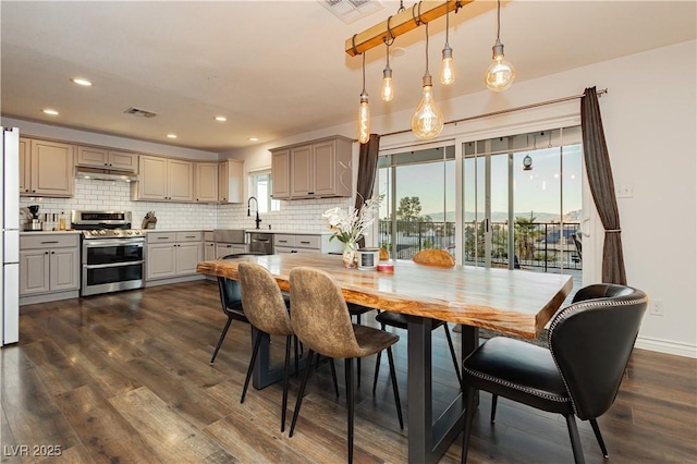 200 E Desert Rose Dr, Henderson, NV 89015 - dining room featuring dark wood-style flooring, recessed lighting, and baseboards