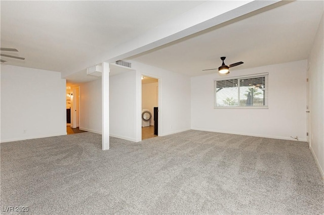 200 E Desert Rose Dr, Henderson, NV 89015 - unfurnished room with a ceiling fan, carpet flooring, washer / clothes dryer, and baseboards