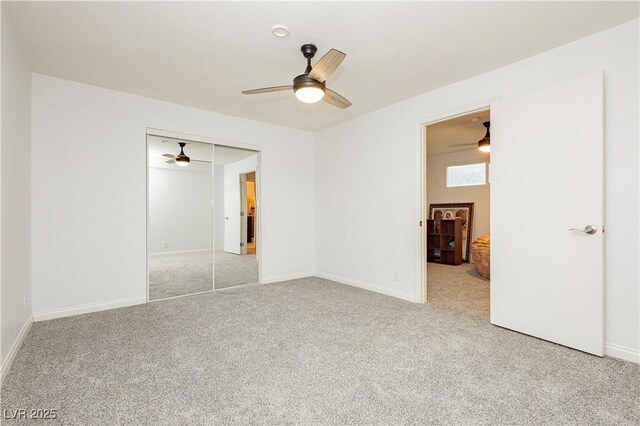 200 E Desert Rose Dr, Henderson, NV 89015 - unfurnished bedroom with light carpet, a closet, baseboards, and ceiling fan