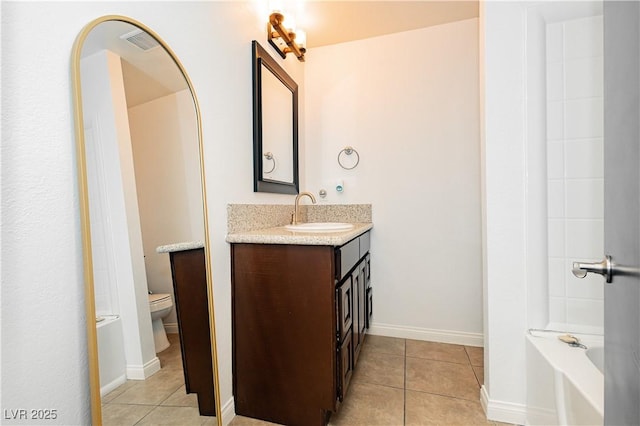 200 E Desert Rose Dr, Henderson, NV 89015 - full bath featuring tile patterned flooring, vanity, a bathtub, and toilet
