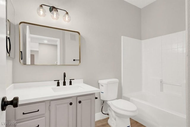 5655 E Sahara Ave Unit 2009, Las Vegas, NV 89142 - bathroom with vanity, toilet, and wood finished floors