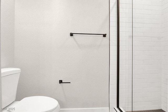 5655 E Sahara Ave Unit 2009, Las Vegas, NV 89142 - bathroom featuring toilet and a stall shower
