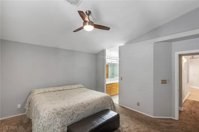 5553 Super Bowl Dr, Las Vegas, NV 89110 - bedroom featuring lofted ceiling, carpet floors, baseboards, a ceiling fan, and ensuite bath