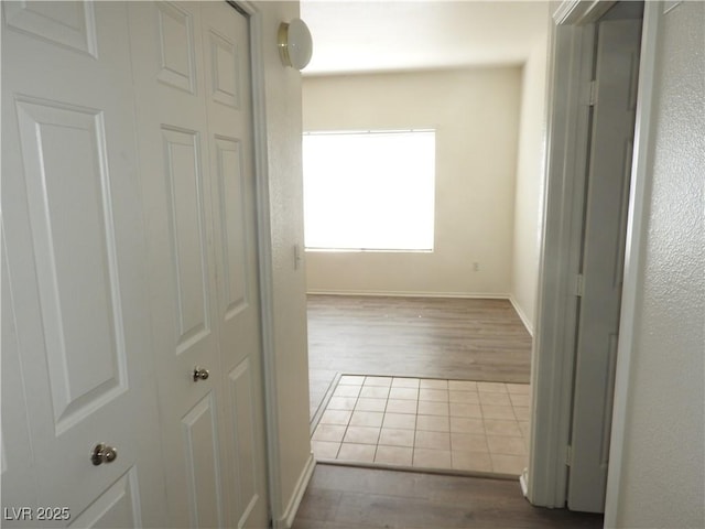 9470 Peace Way Unit 112, Las Vegas, NV 89147 - hall featuring wood finished floors and baseboards