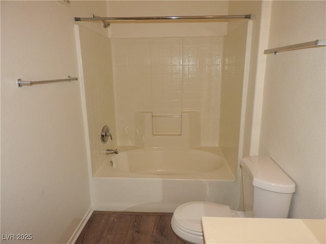 9470 Peace Way Unit 112, Las Vegas, NV 89147 - full bath featuring toilet, wood finished floors, shower / tub combination, baseboards, and vanity