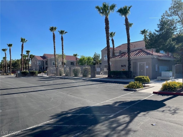 9470 Peace Way Unit 112, Las Vegas, NV 89147 - view of asphalt street featuring a gate