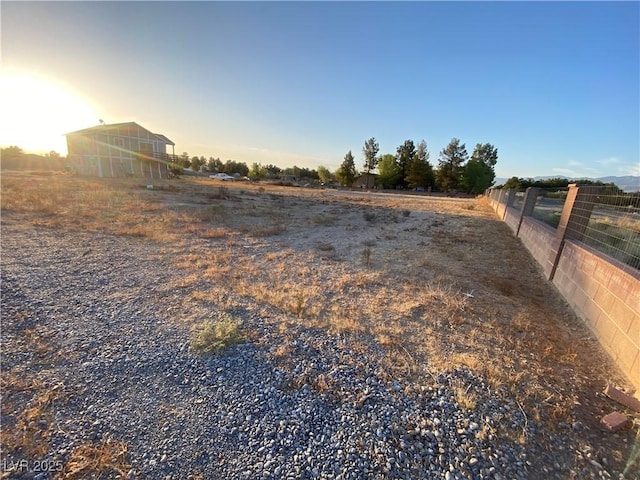 4910 Elizabeth St, Pahrump, NV 89048 - view of yard featuring fence and a view of countryside