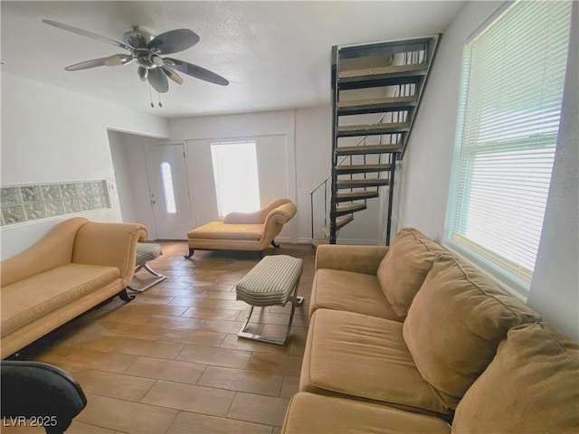 4910 Elizabeth St, Pahrump, NV 89048 - living room with stairs and ceiling fan