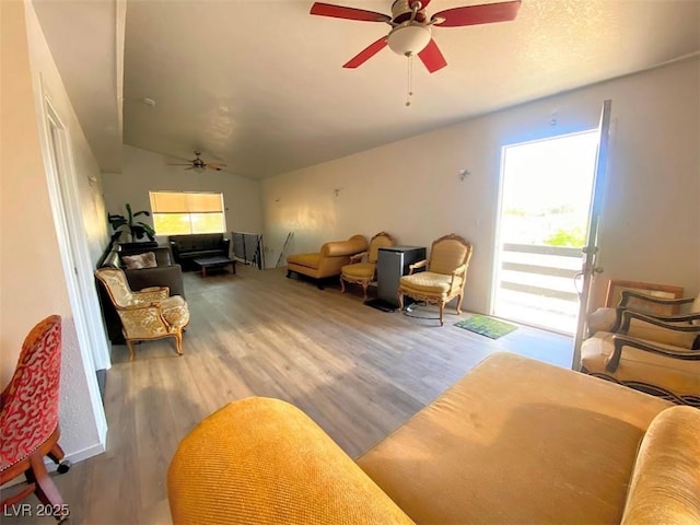 4910 Elizabeth St, Pahrump, NV 89048 - living room featuring ceiling fan, wood finished floors, and lofted ceiling