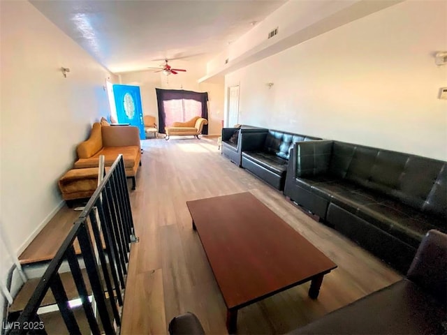 4910 Elizabeth St, Pahrump, NV 89048 - living room with ceiling fan, light wood-style flooring, and lofted ceiling