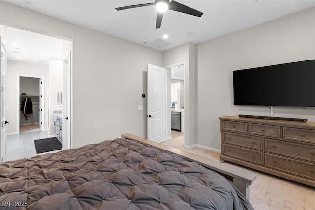 8929 Cassia Winds St, Las Vegas, NV 89166 - bedroom with baseboards, recessed lighting, a ceiling fan, ensuite bathroom, and light carpet