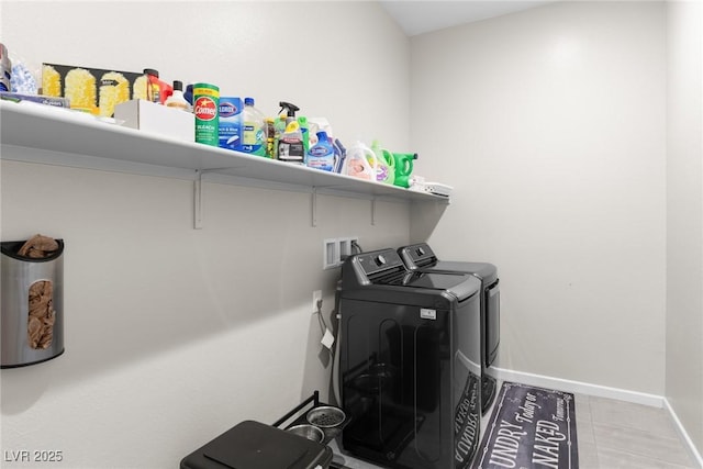 8929 Cassia Winds St, Las Vegas, NV 89166 - clothes washing area with washing machine and clothes dryer, baseboards, and tile patterned floors