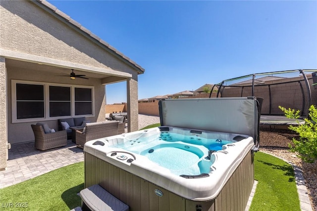 8929 Cassia Winds St, Las Vegas, NV 89166 - wooden deck with a hot tub, an outdoor hangout area, a patio area, a fenced backyard, and ceiling fan