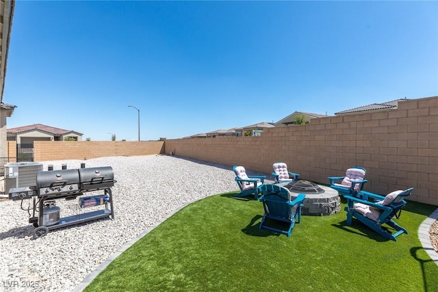 8929 Cassia Winds St, Las Vegas, NV 89166 - view of yard featuring a fire pit